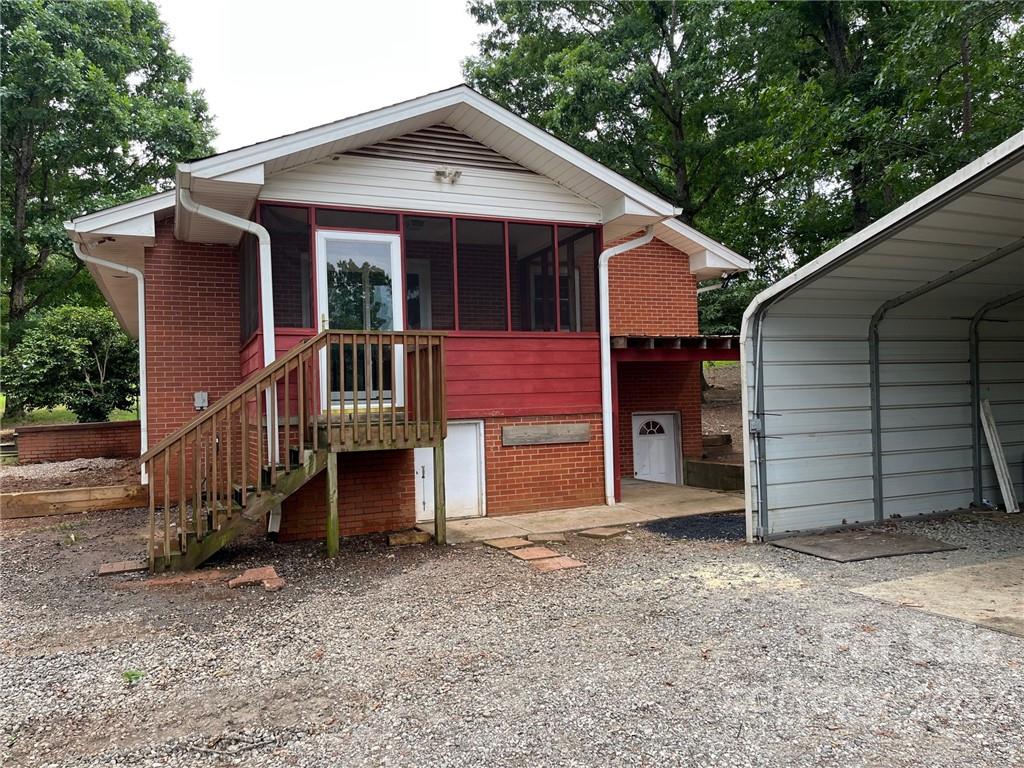 612 Mcdade Road Tryon, NC 28782 - Photo 3 of 27 a view of a house with a yard