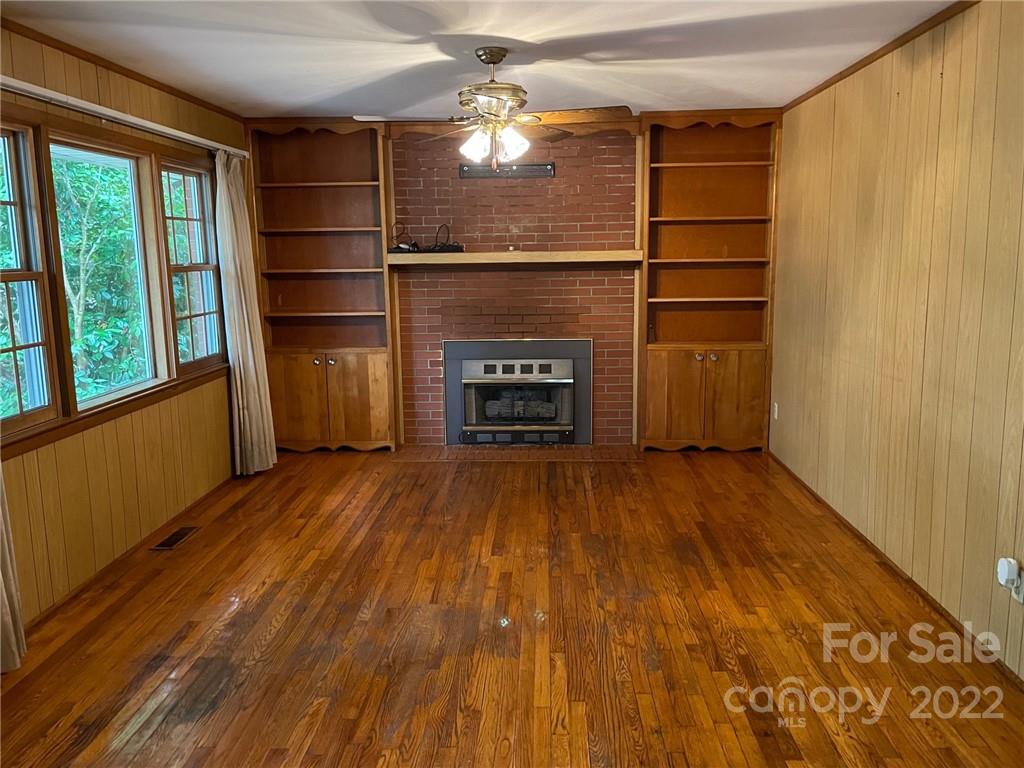 612 Mcdade Road Tryon, NC 28782 - Photo 8 of 27 a view of a room with wooden floor and a window
