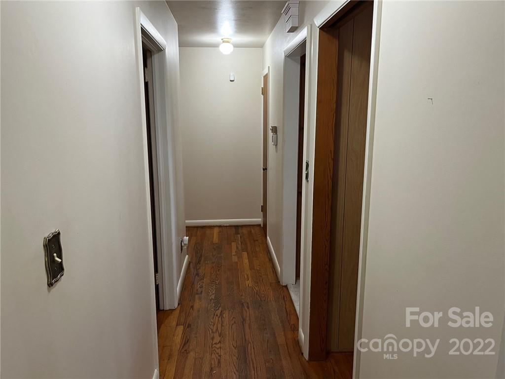 612 Mcdade Road Tryon, NC 28782 - Photo 10 of 27 a view of a hallway with wooden floor
