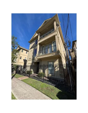 a black and white photo of a house