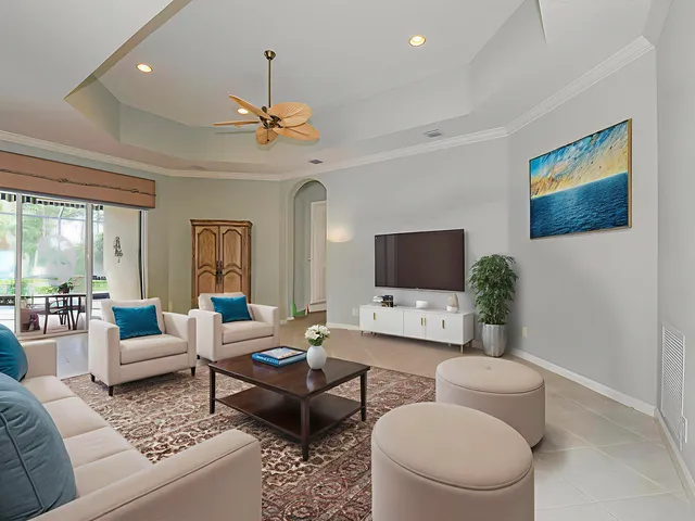 an aerial view of a house with yard swimming pool and outdoor seating