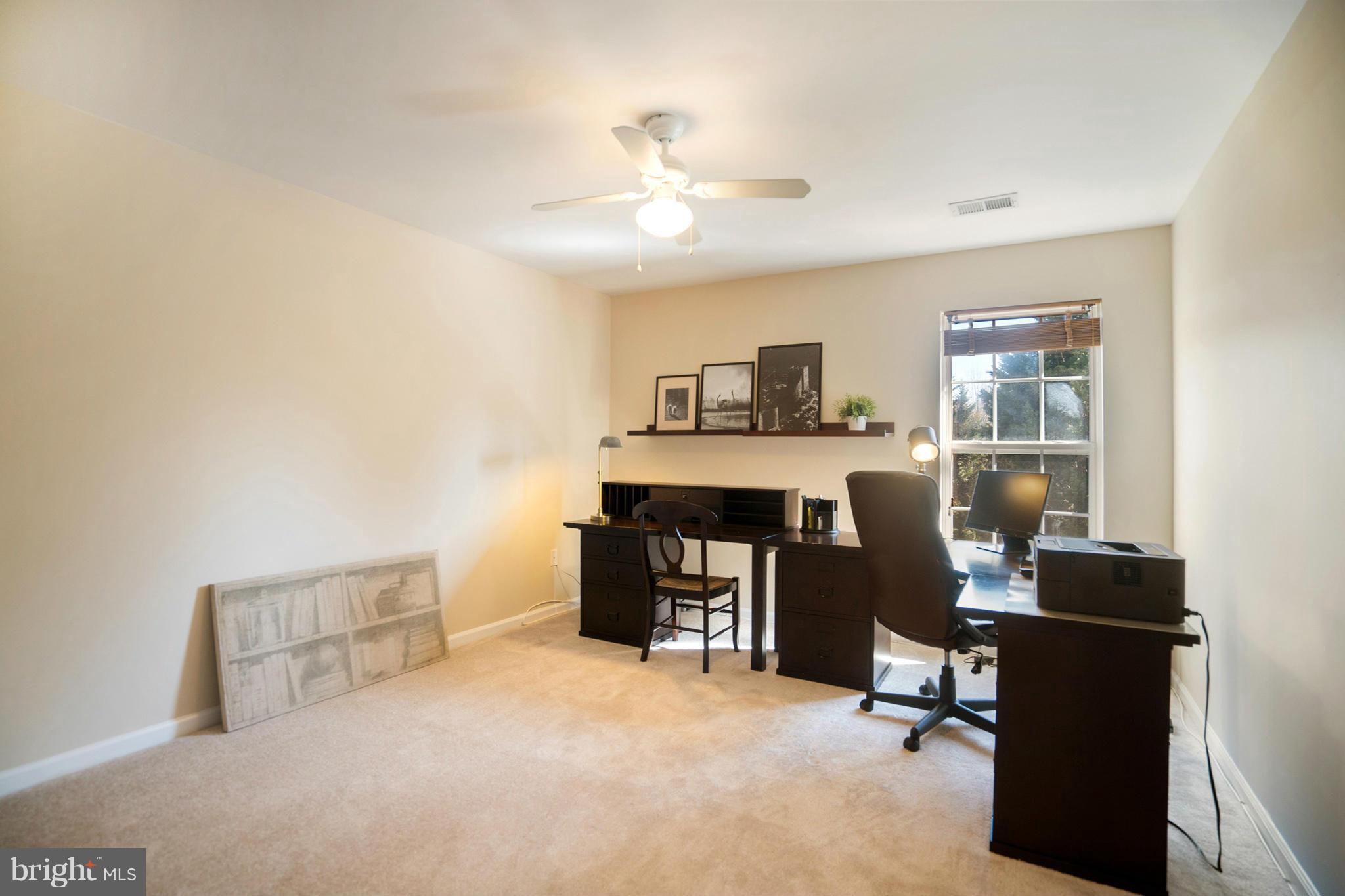 14202 Brass Wheel Road Boyds, MD 20841 - Photo 21 of 27 a view of a workspace with furniture