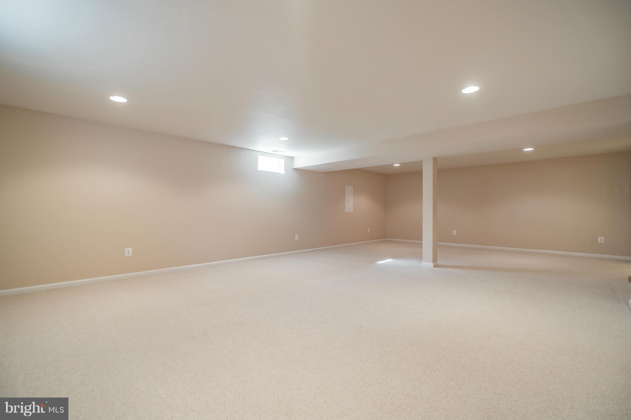 14202 Brass Wheel Road Boyds, MD 20841 - Photo 23 of 27 an empty room with an empty space