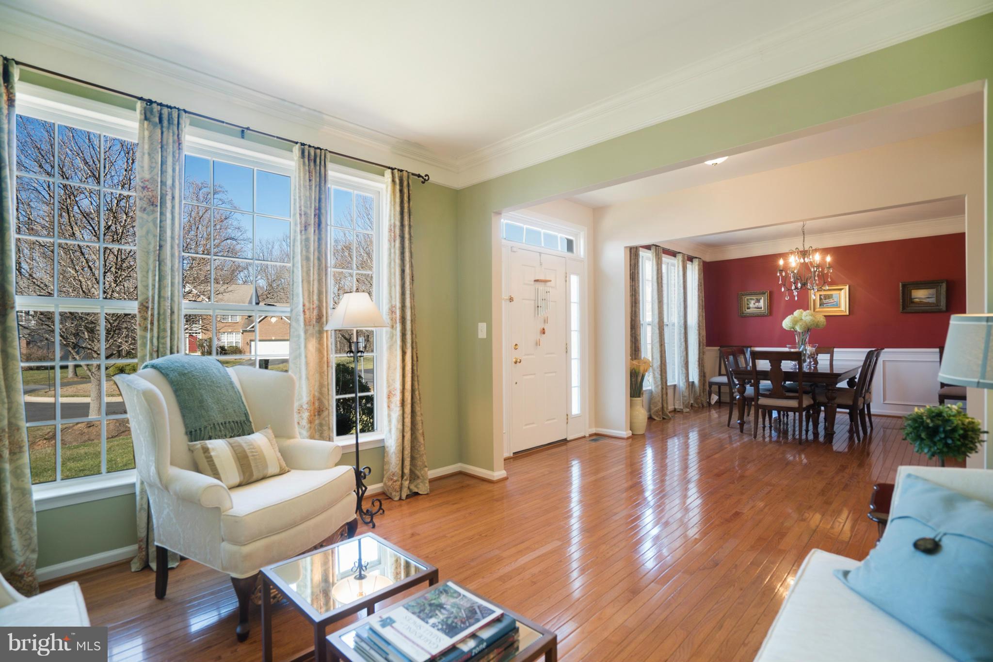 14202 Brass Wheel Road Boyds, MD 20841 - Photo 6 of 27 a living room with furniture and a large window