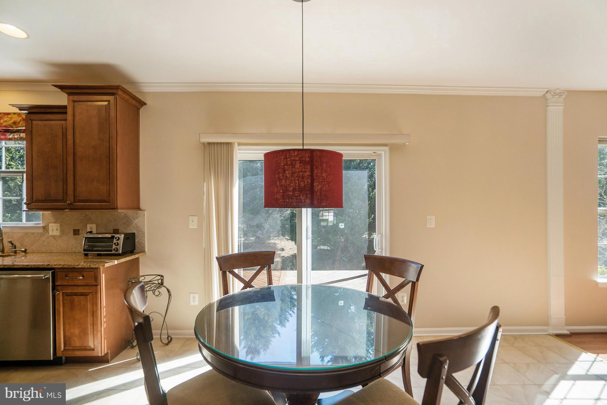 14202 Brass Wheel Road Boyds, MD 20841 - Photo 10 of 27 a dining room with furniture and window