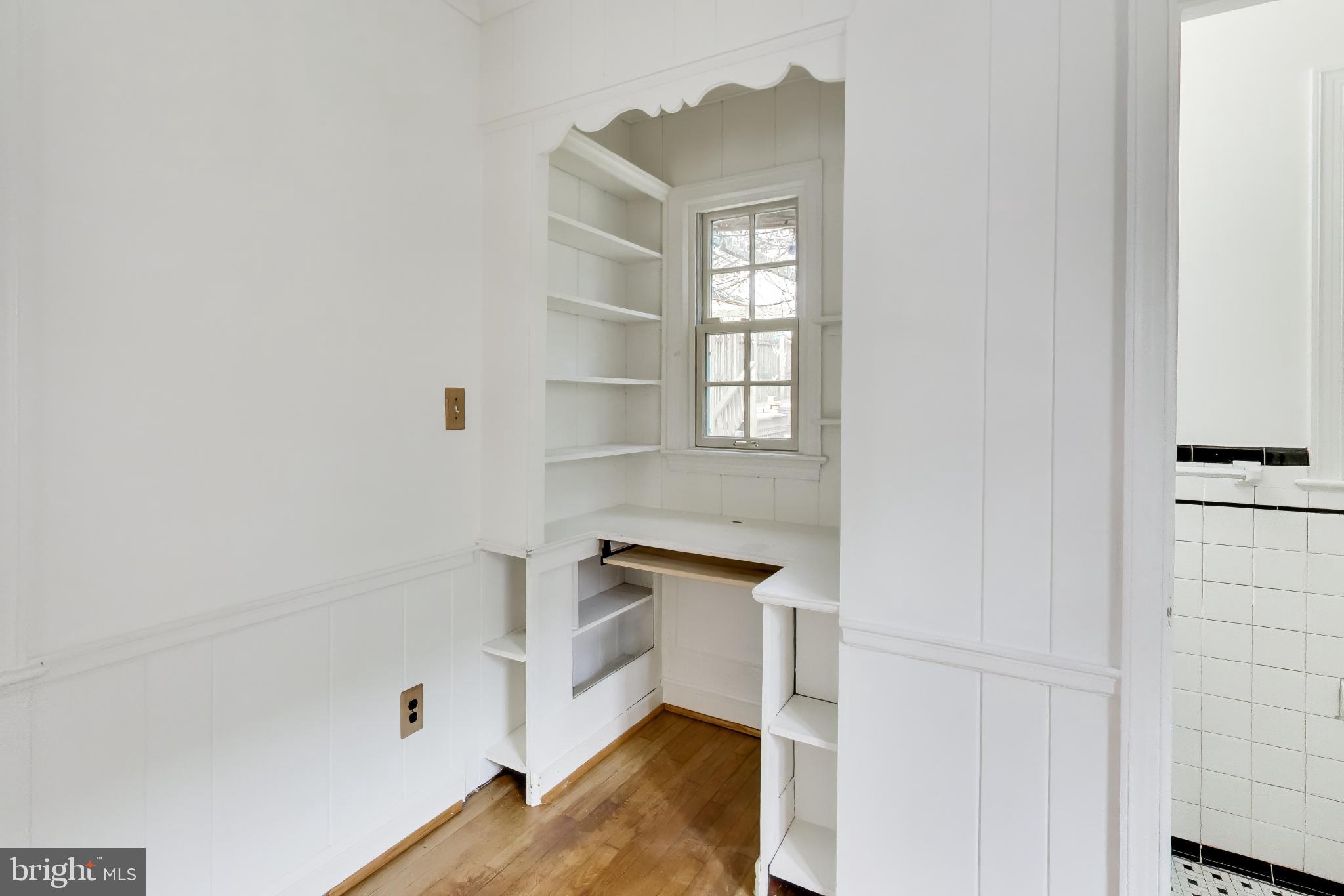 5138 Nebraska Avenue Northwest Washington, DC 20008 - Photo 15 of 39 a view of wooden floor and windows in a room