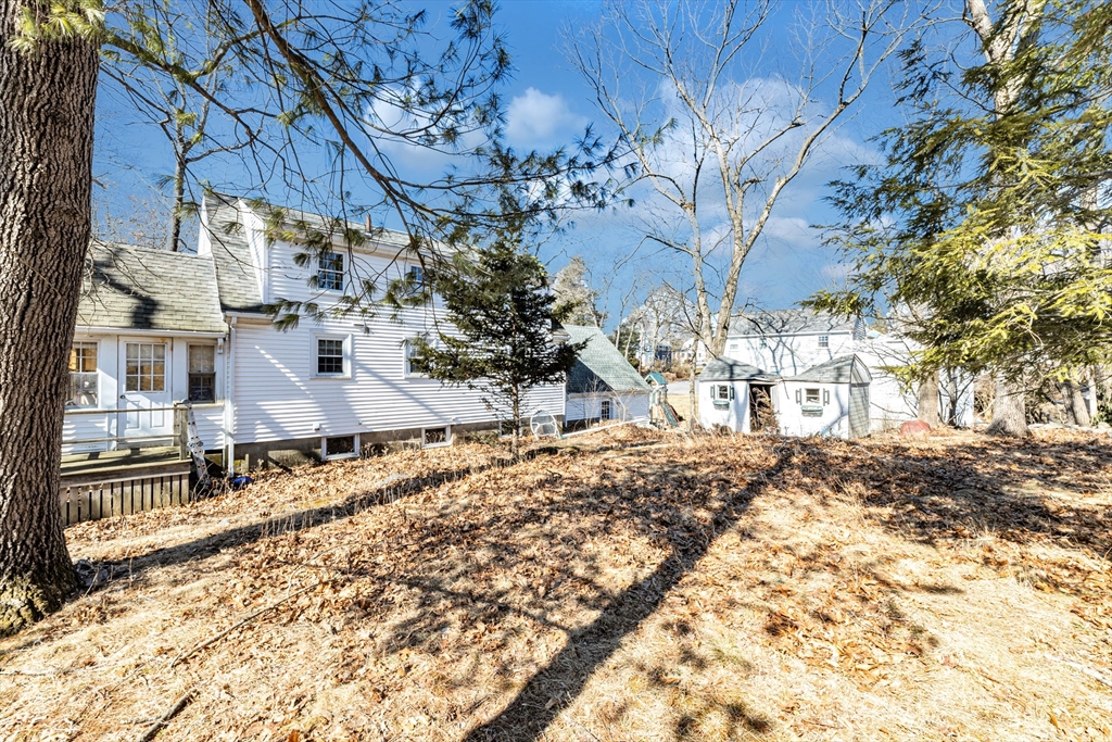 92 Intervale Road Dedham, MA 02026 - Photo 9 of 9 a view of a yard with snow on the road