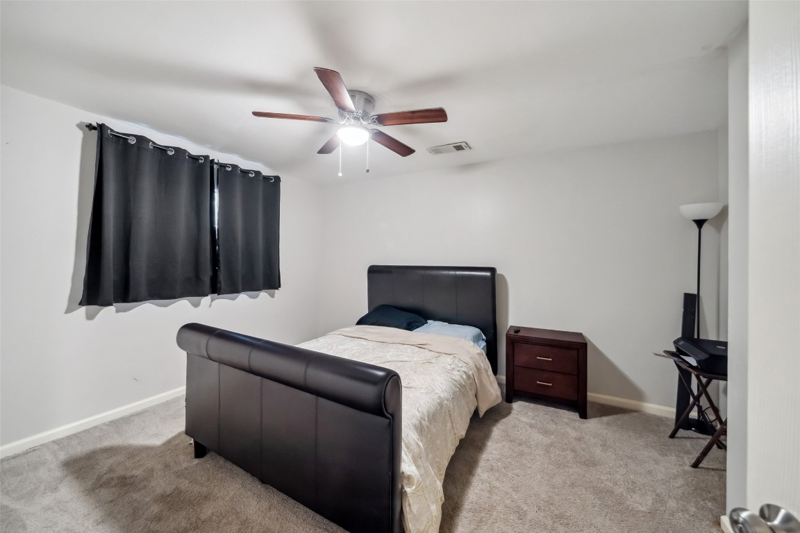 202 Black Forest Drive Spring, TX 77388 - Photo 21 of 29 a room with a bed and a television