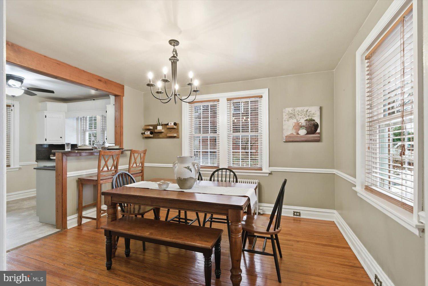 845 Paramount Avenue Lancaster, PA 17602 - Photo 11 of 49 a dining room with furniture a chandelier and wooden floor