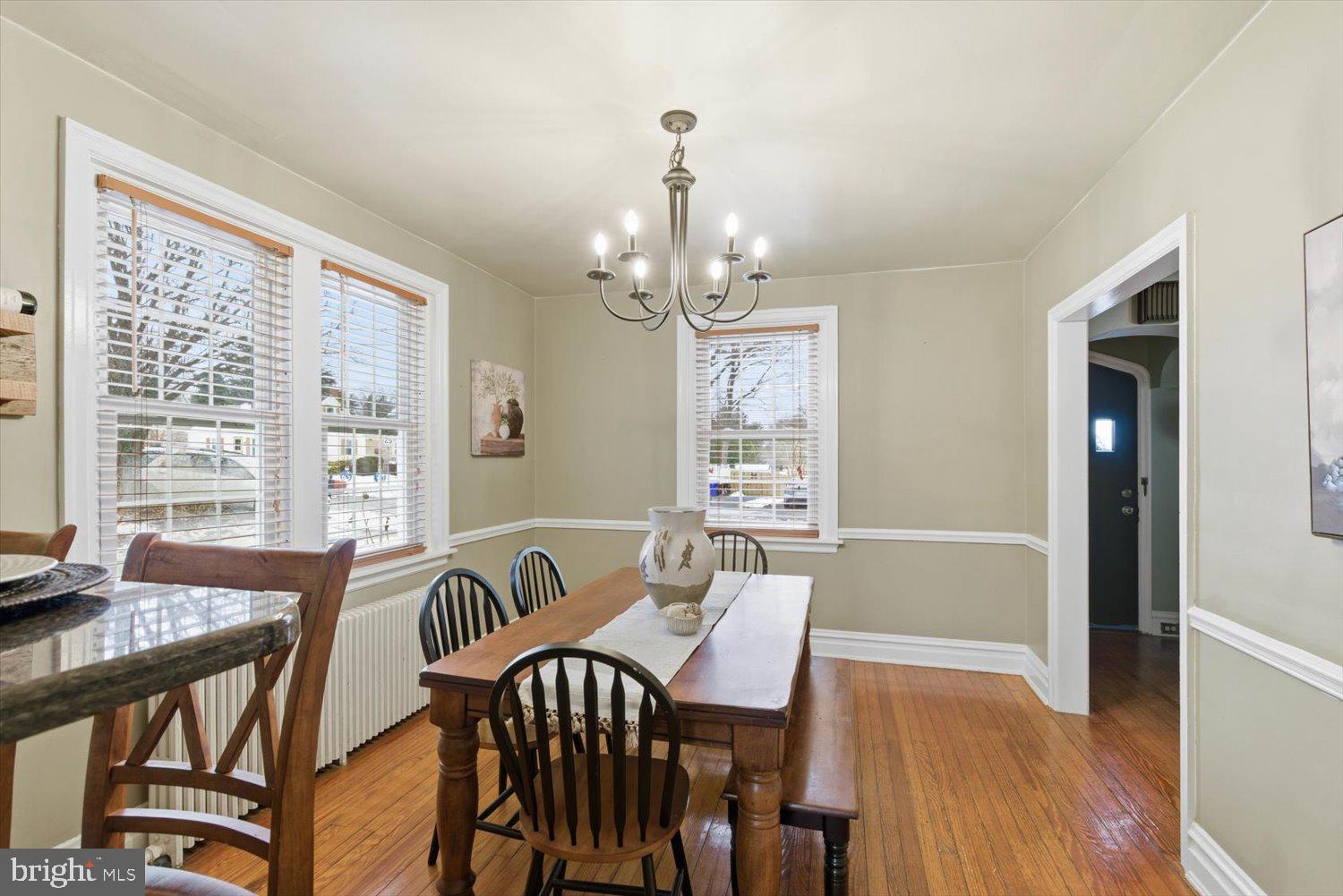 845 Paramount Avenue Lancaster, PA 17602 - Photo 12 of 49 a view of a dining room with furniture window and wooden floor