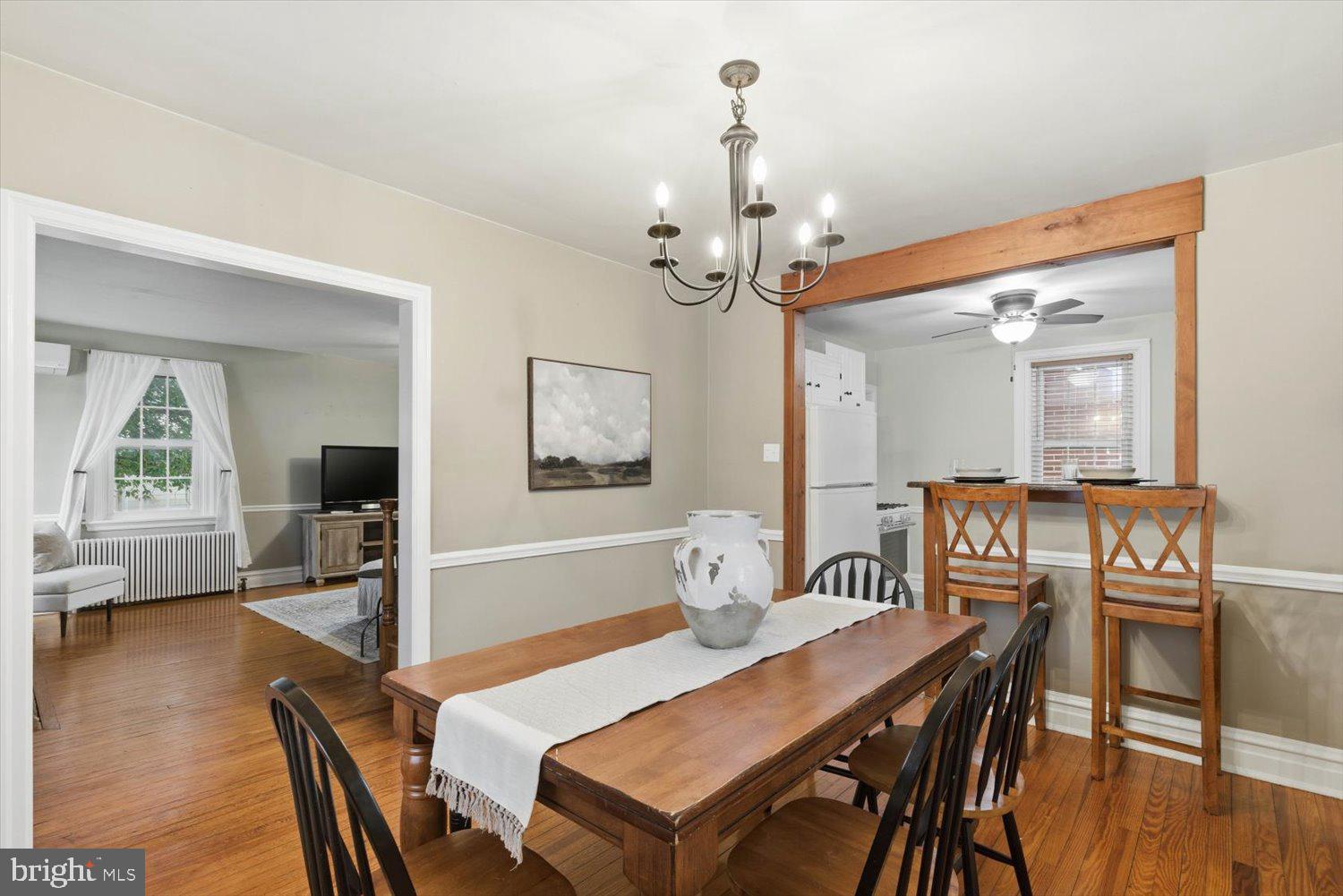 845 Paramount Avenue Lancaster, PA 17602 - Photo 13 of 49 a view of a dining room with furniture and wooden floor