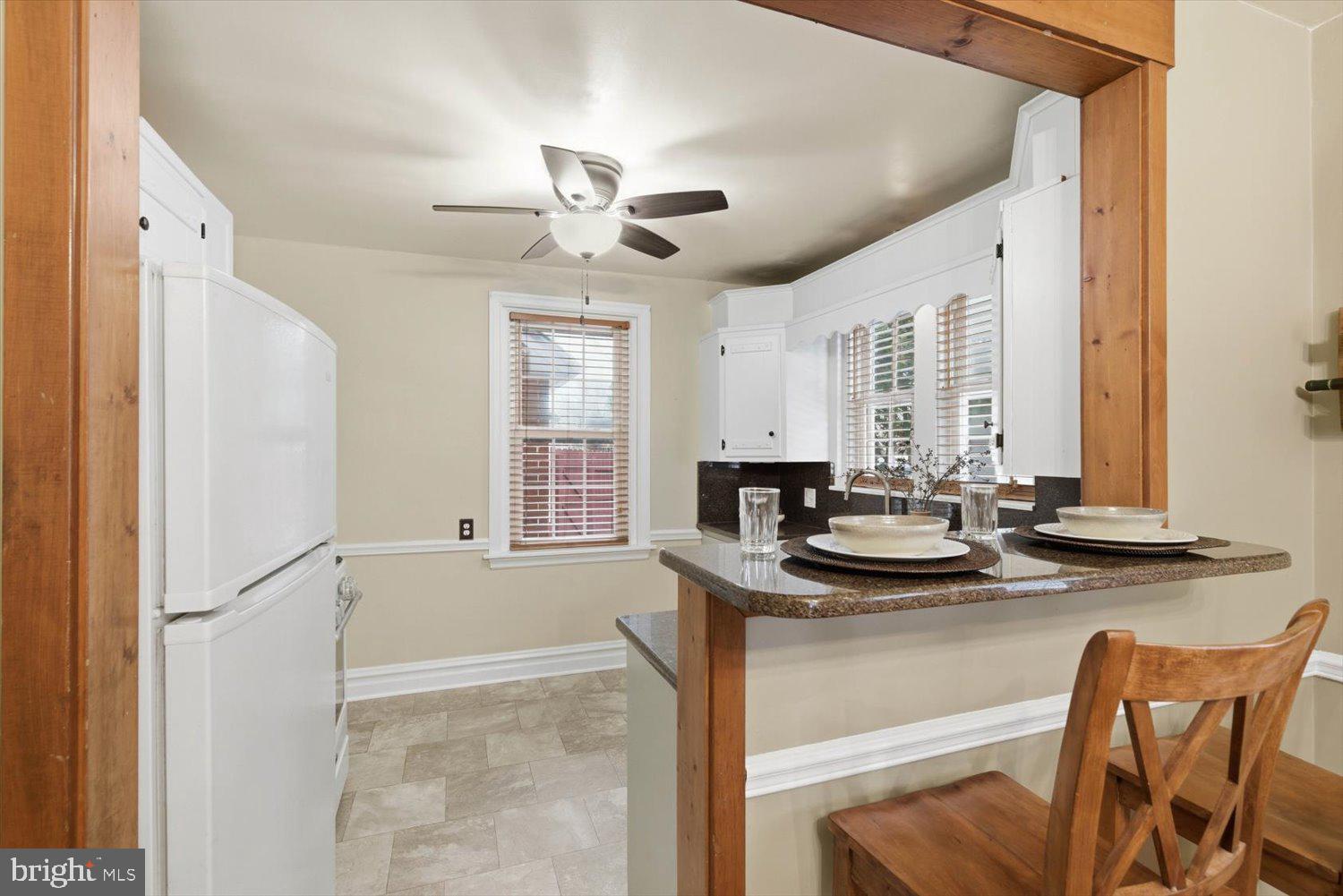 845 Paramount Avenue Lancaster, PA 17602 - Photo 15 of 49 a kitchen with stainless steel appliances kitchen island granite countertop a sink and cabinets