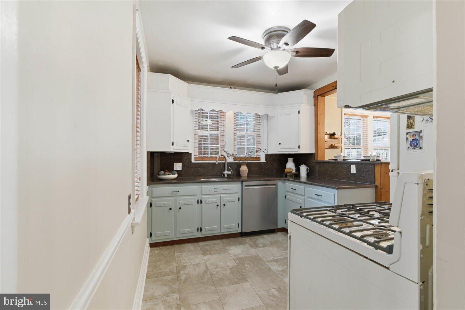 845 Paramount Avenue Lancaster, PA 17602 - Photo 19 of 49 a kitchen with stainless steel appliances granite countertop a stove a sink and a refrigerator