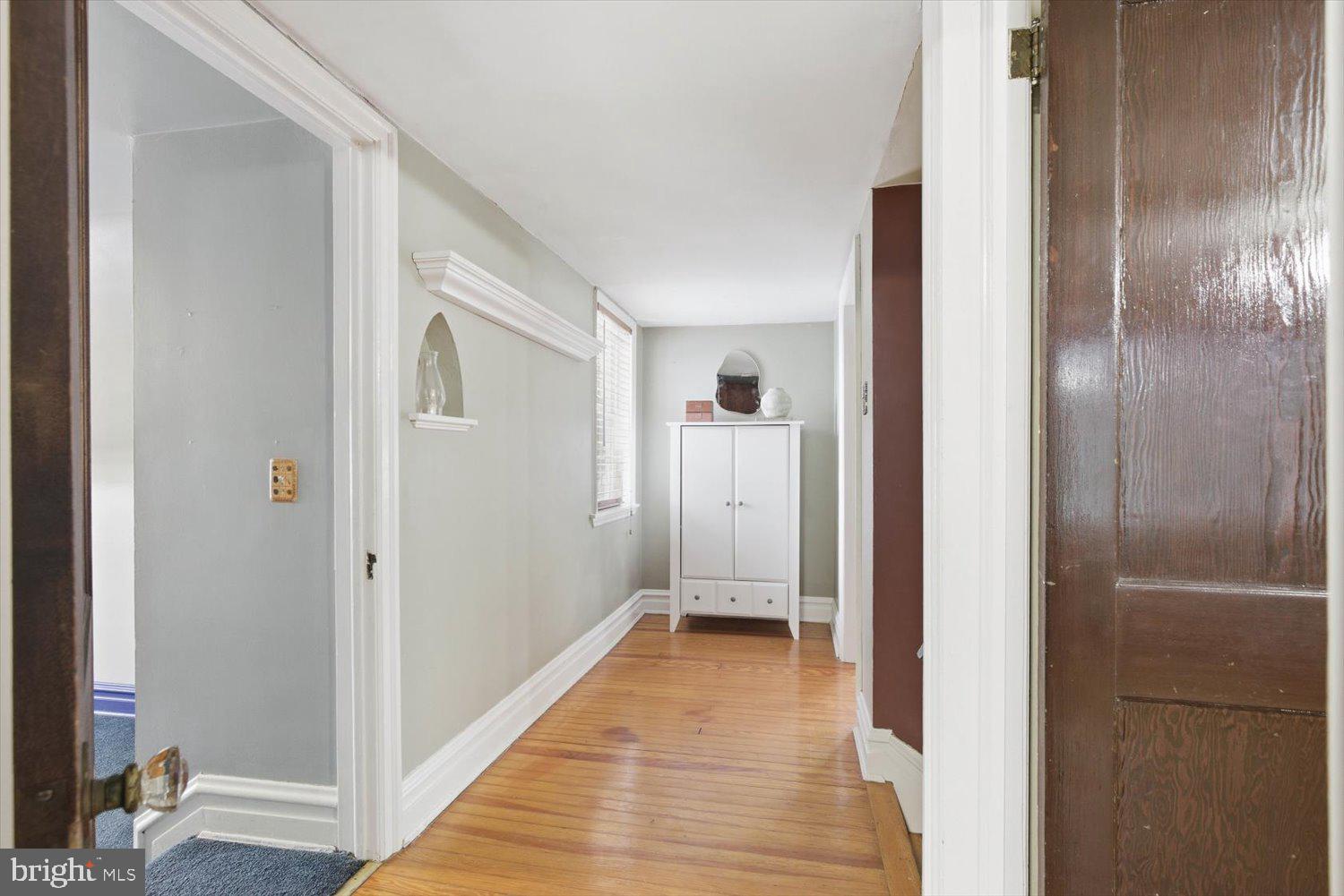 845 Paramount Avenue Lancaster, PA 17602 - Photo 25 of 49 a view of a hallway with wooden floor