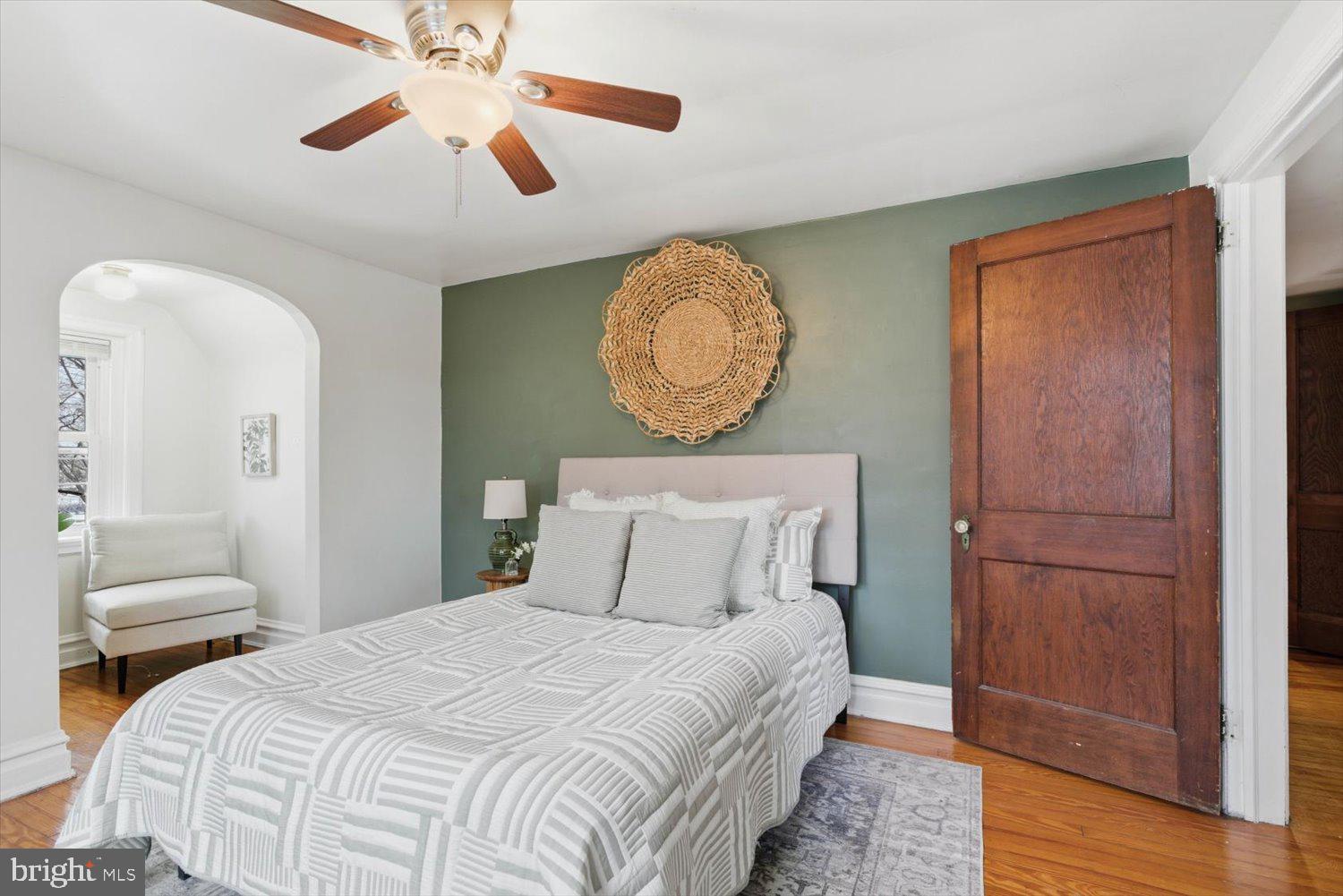 845 Paramount Avenue Lancaster, PA 17602 - Photo 28 of 49 a bedroom with a bed and a chandelier