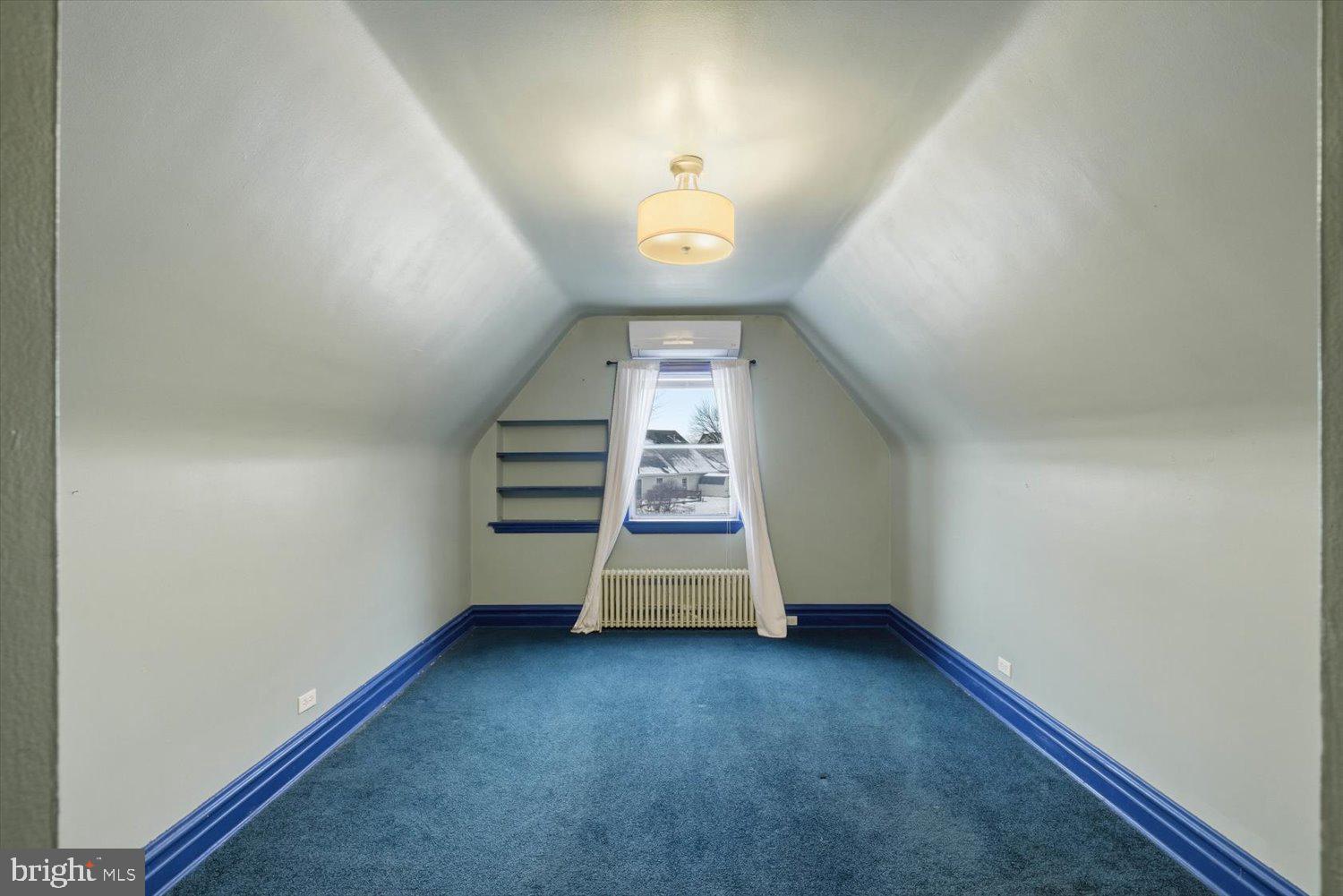 845 Paramount Avenue Lancaster, PA 17602 - Photo 33 of 49 an empty room with a ceiling fan and wooden floor