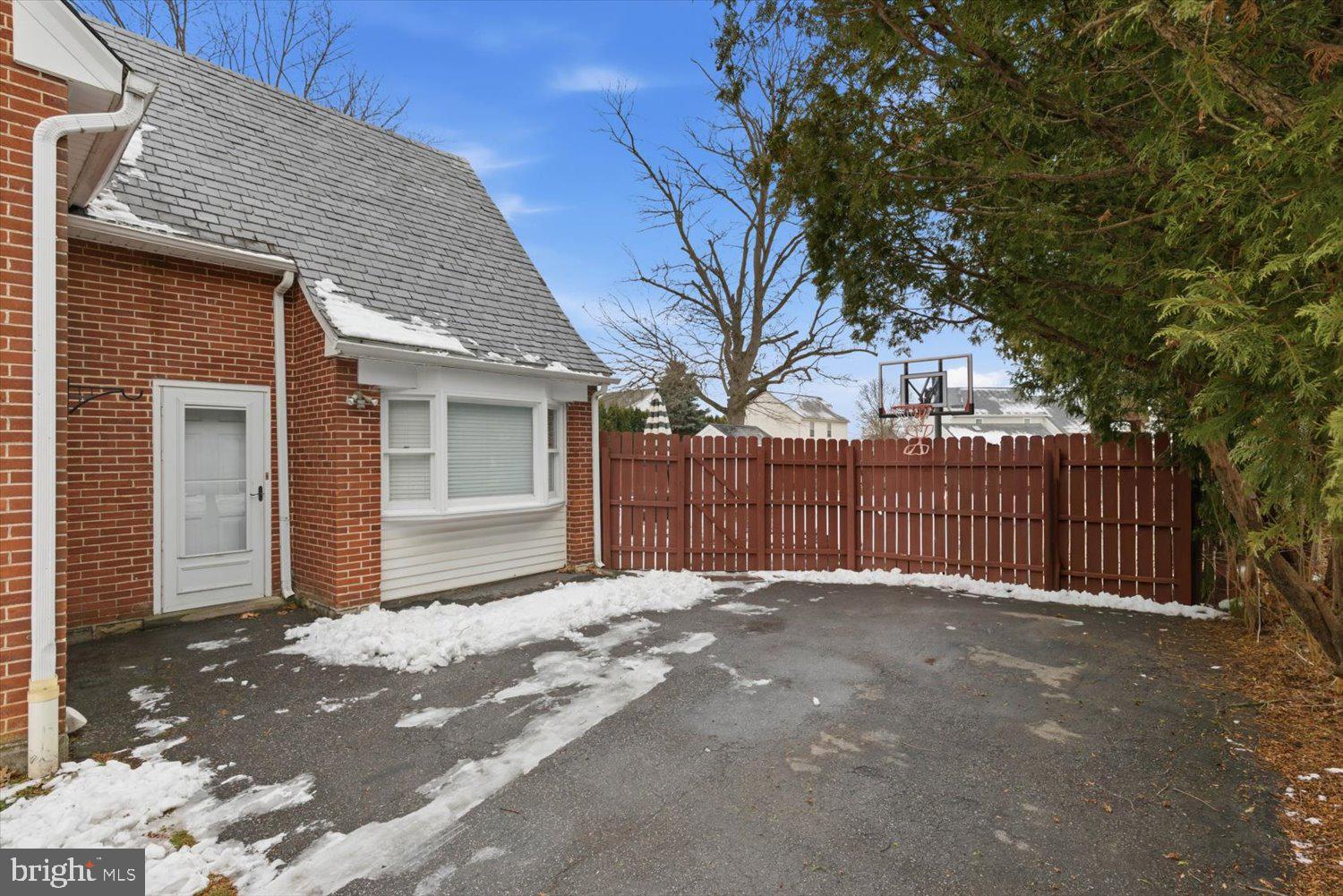 845 Paramount Avenue Lancaster, PA 17602 - Photo 42 of 49 a view of a house with a small yard and a large tree