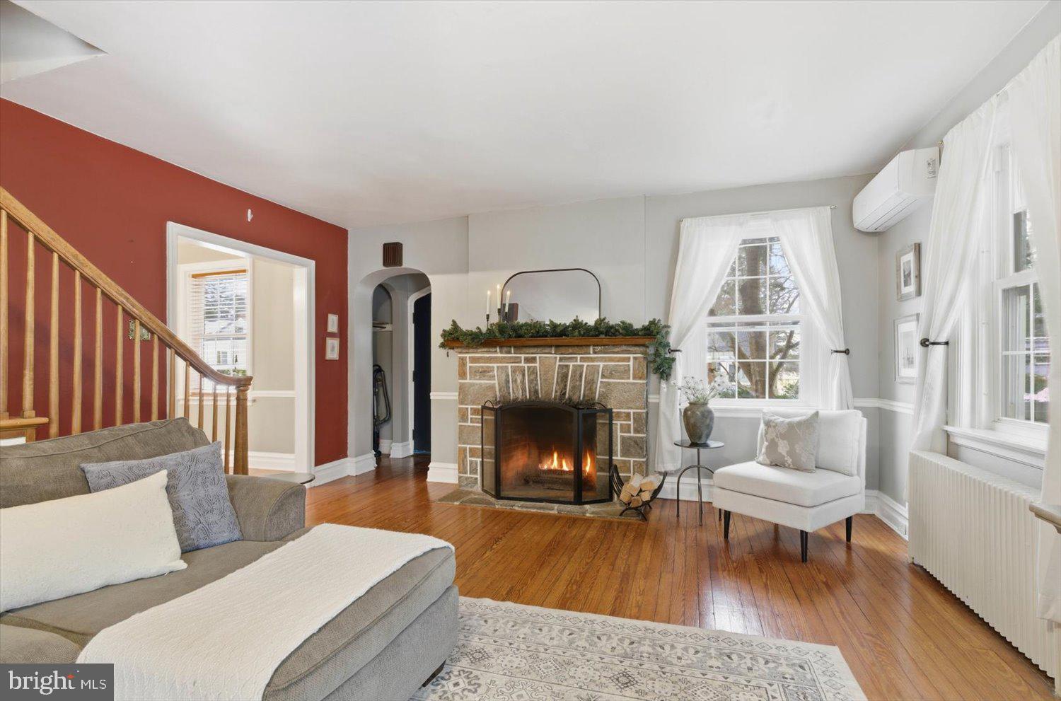 845 Paramount Avenue Lancaster, PA 17602 - Photo 10 of 49 a living room with furniture and a fireplace