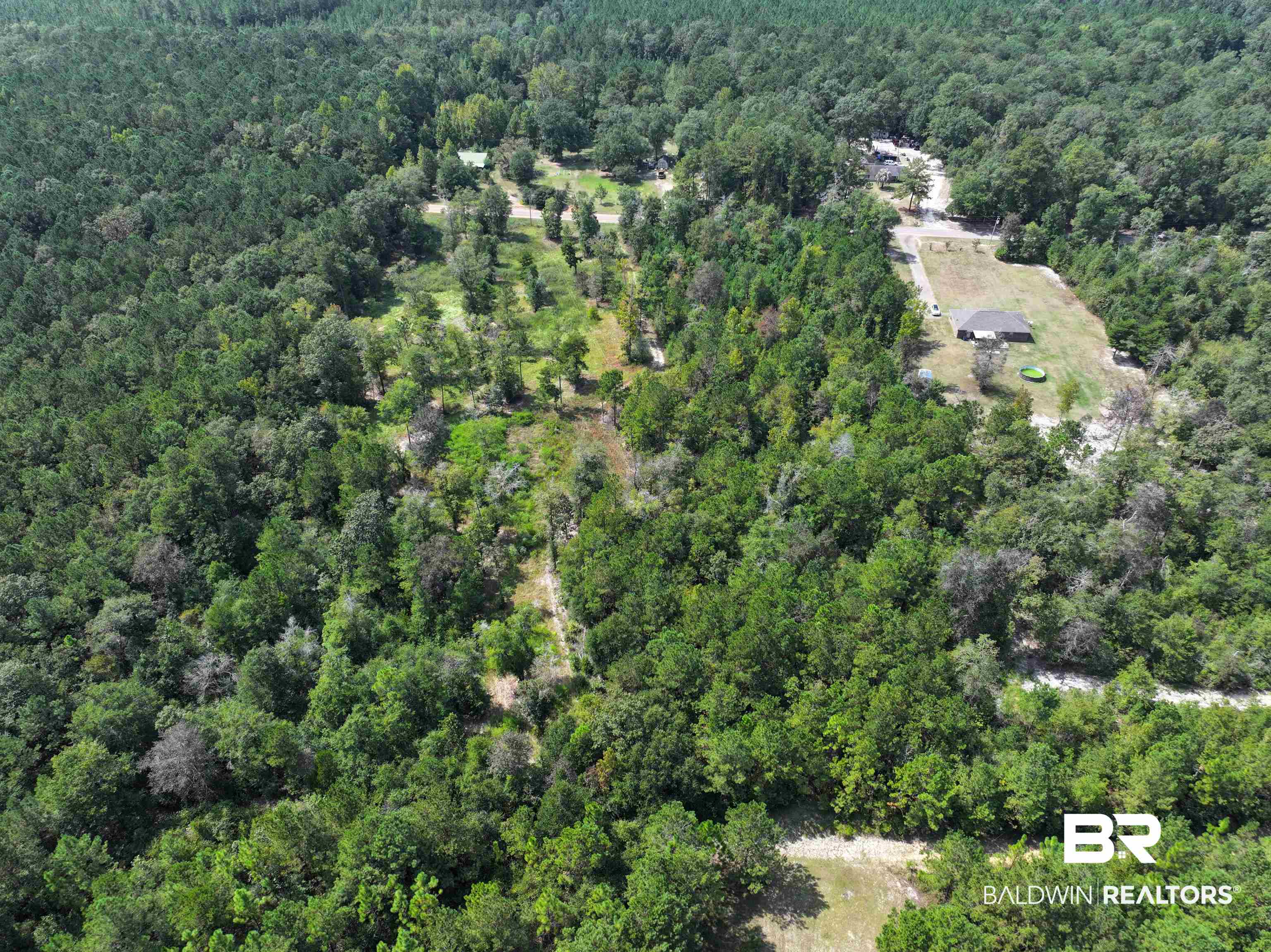 0 Dixon Nursery Road Brewton, AL 36426 - Photo 3 of 4 Aerial view of property and surrounding area featuring a forest