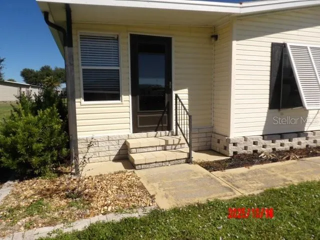 a view of a house with a patio