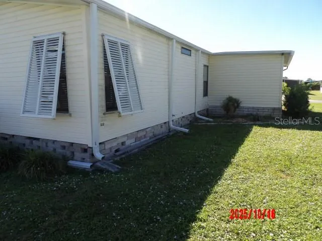 a backyard of a house with garden