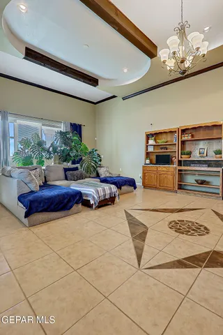 a kitchen with stainless steel appliances granite countertop a stove top oven a sink dishwasher and cabinets with wooden floor