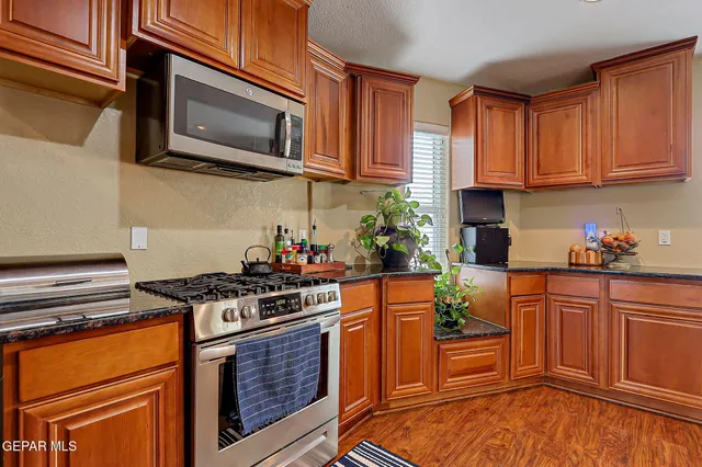 a bathroom with a sink a vanity and a mirror