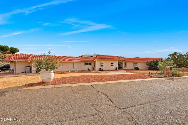 a view of an ocean beach and city