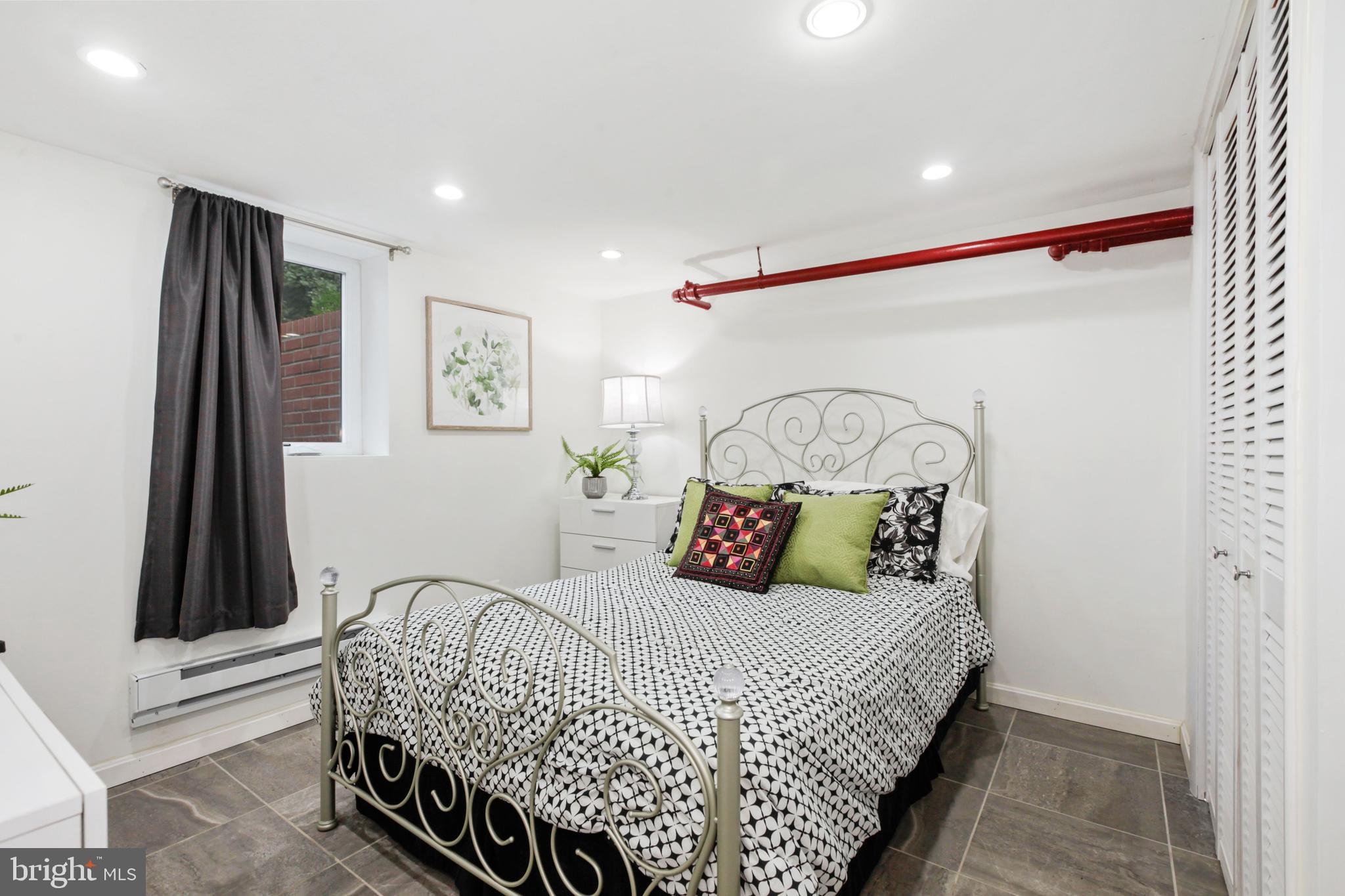 6108 River Road Bethesda, MD 20817 - Photo 32 of 41 Lower level bedroom