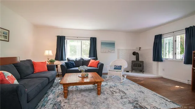 a living room with furniture and a table