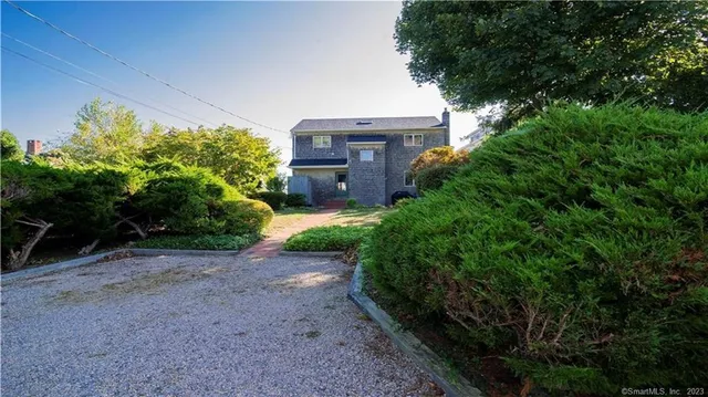 a view of staircase with furniture