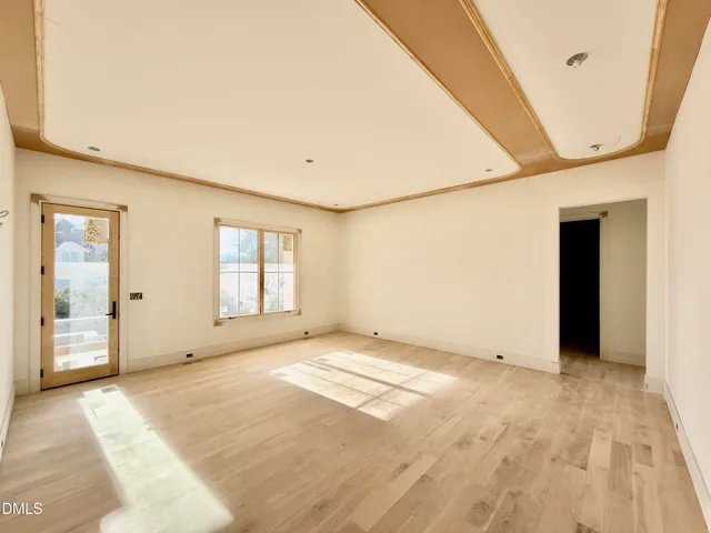 a living room with a couch and a window