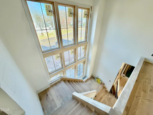 a view of an empty room and a window