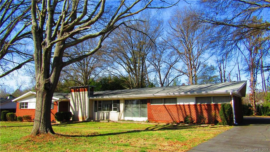 4901 Cheviot Road Charlotte, NC 28269 - Photo 1 of 23 a view of a house with a yard