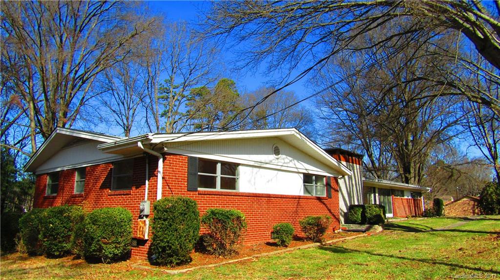 4901 Cheviot Road Charlotte, NC 28269 - Photo 23 of 23 a front view of a house with a yard