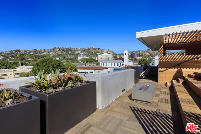 a view of a building with a garden