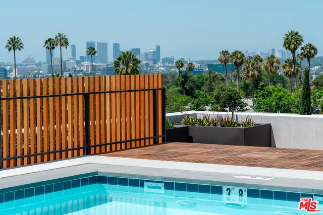 a view of a house with a swimming pool