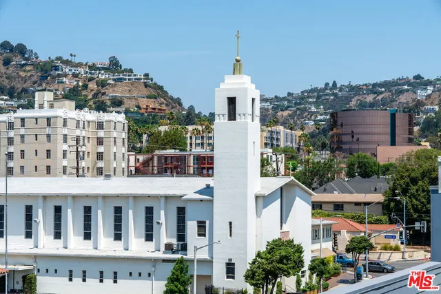 a view of a city with tall buildings