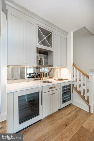 a room with a closet and windows