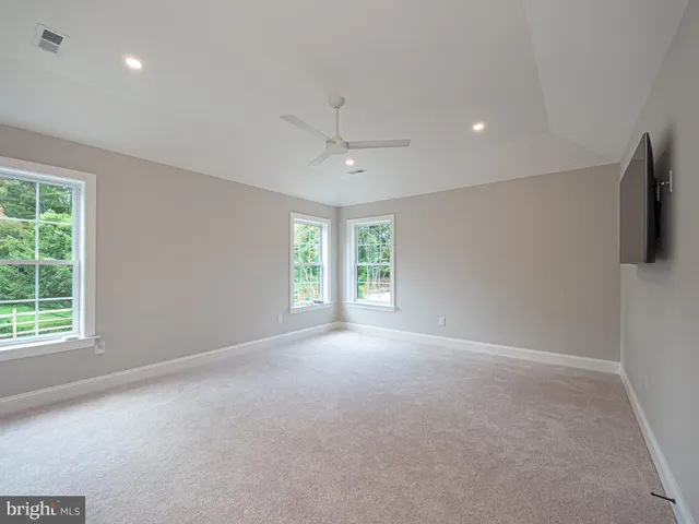 a view of house with yard