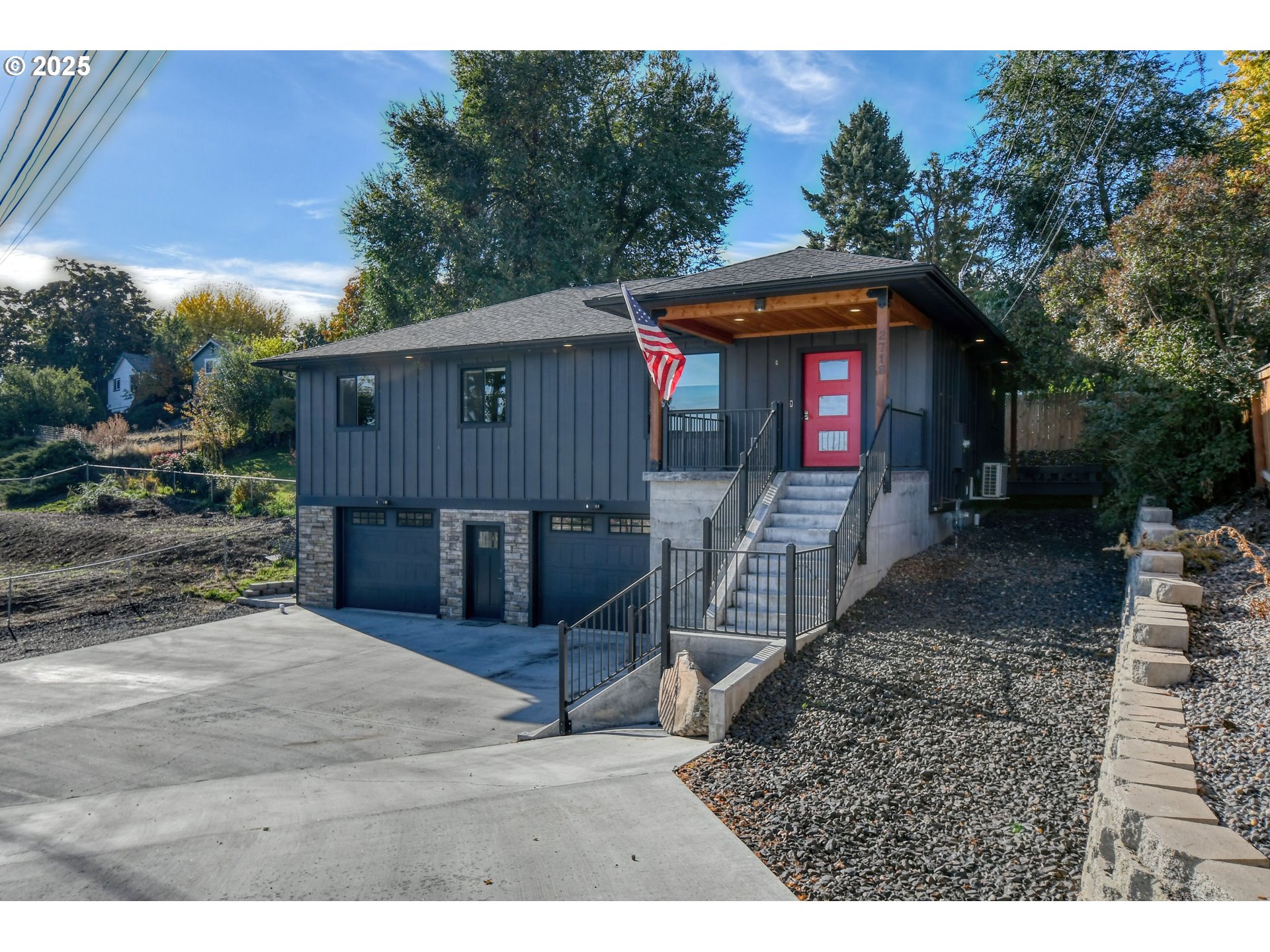 2716 Southwest Hailey Avenue Pendleton, OR 97801 - Photo 1 of 40 a view of a wooden house with a small yard and large trees