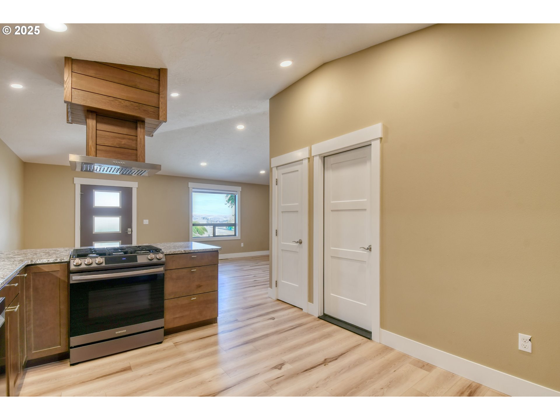 2716 Southwest Hailey Avenue Pendleton, OR 97801 - Photo 12 of 40 a kitchen with stainless steel appliances a stove and a refrigerator