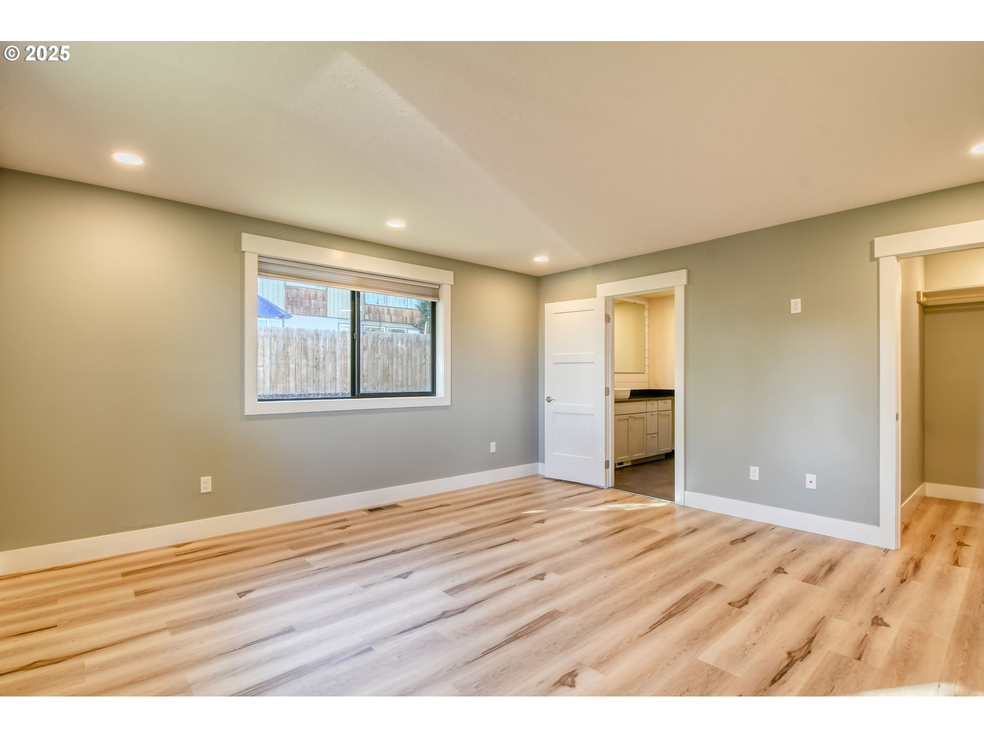 2716 Southwest Hailey Avenue Pendleton, OR 97801 - Photo 16 of 40 a view of an empty room with wooden floor and a window