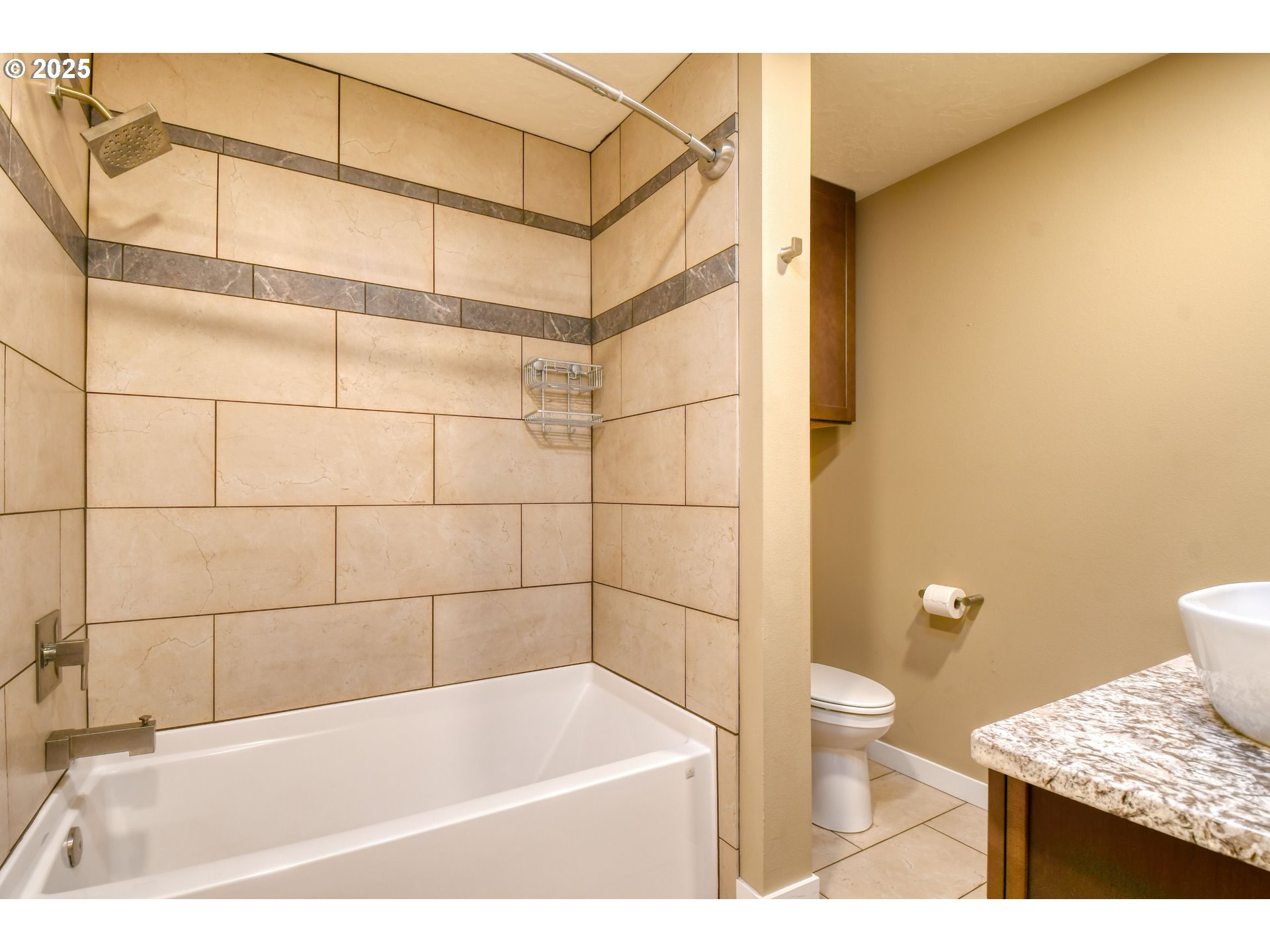 2716 Southwest Hailey Avenue Pendleton, OR 97801 - Photo 22 of 40 a bathroom with a sink a toilet and shower