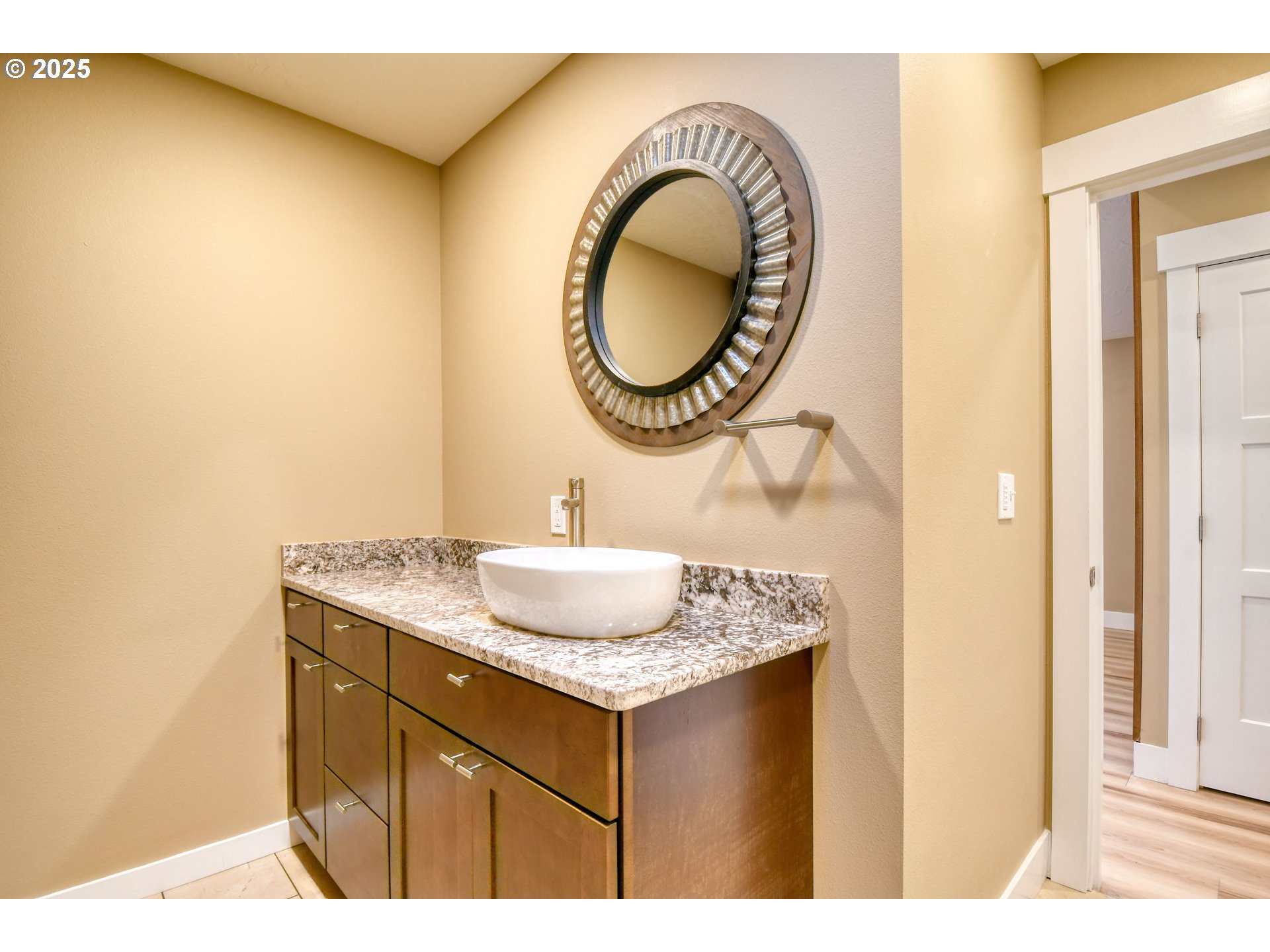 2716 Southwest Hailey Avenue Pendleton, OR 97801 - Photo 23 of 40 a bathroom with a granite countertop sink and a mirror