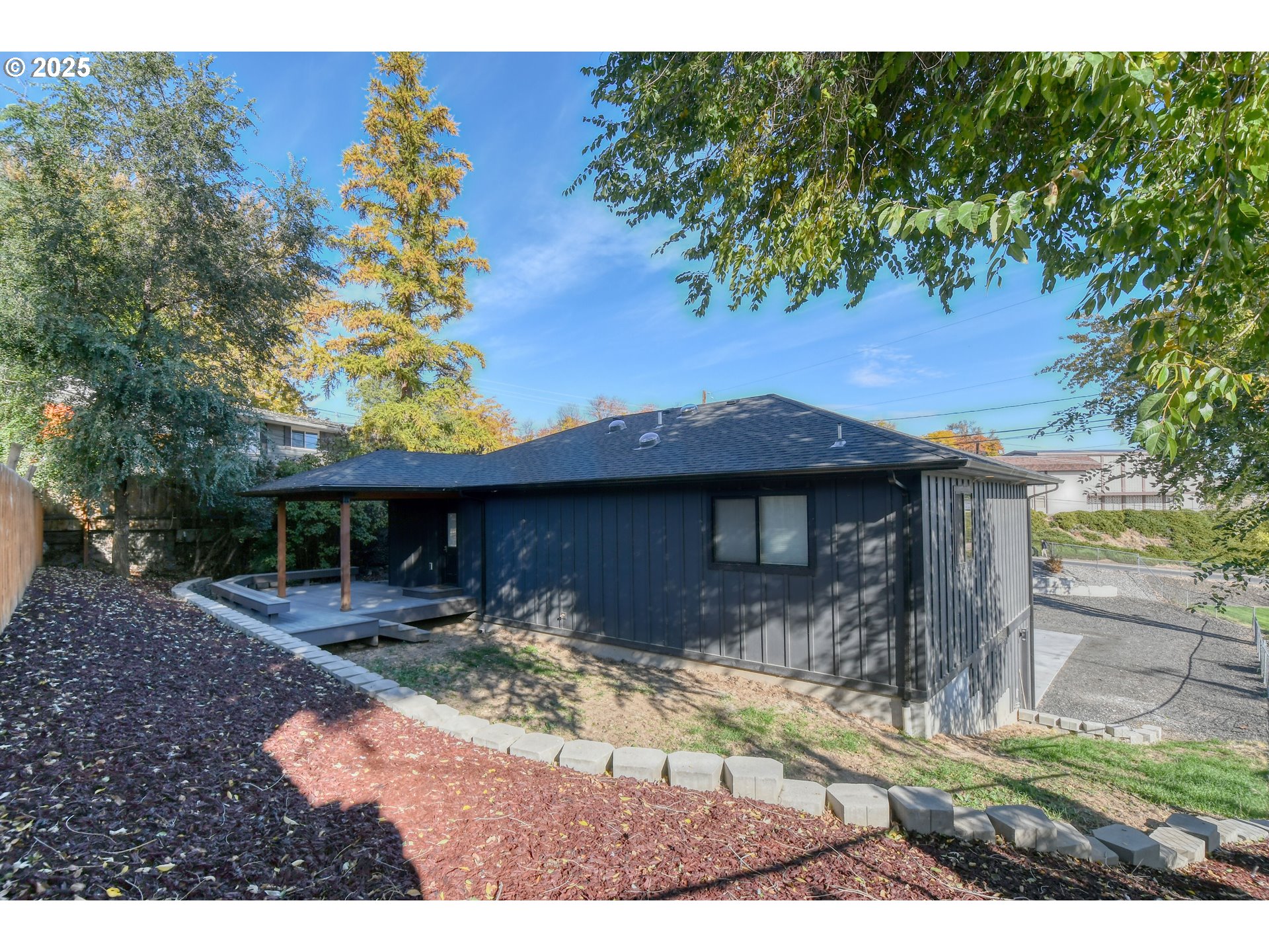 2716 Southwest Hailey Avenue Pendleton, OR 97801 - Photo 33 of 40 a backyard of a house with table and chairs