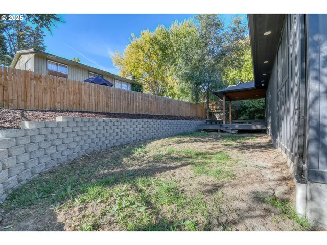 a view of a yard with an outdoor space