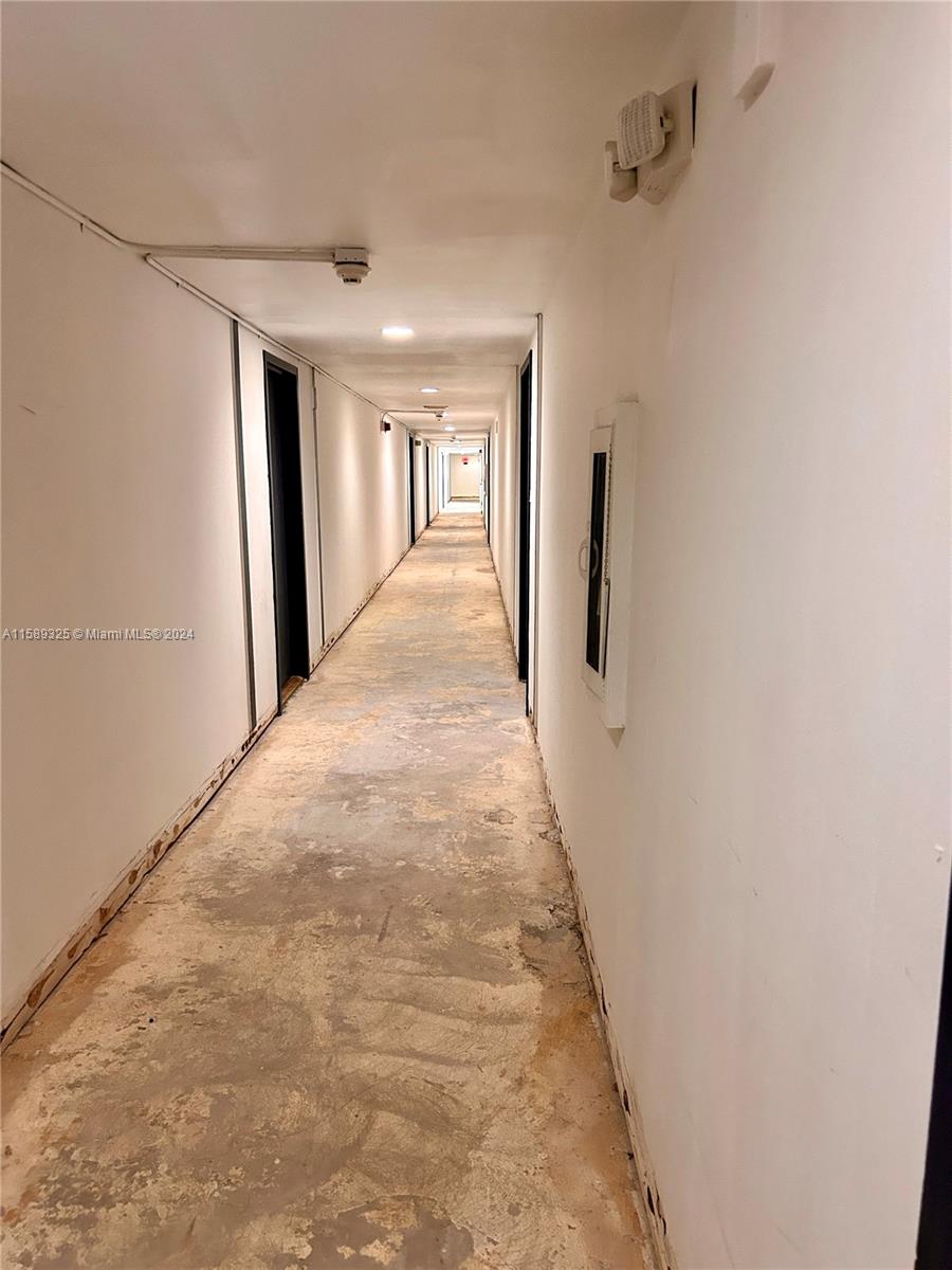 5050 Northwest 7th Street, Unit PH1 Miami, FL 33126 - Photo 3 of 36 a view of a hallway