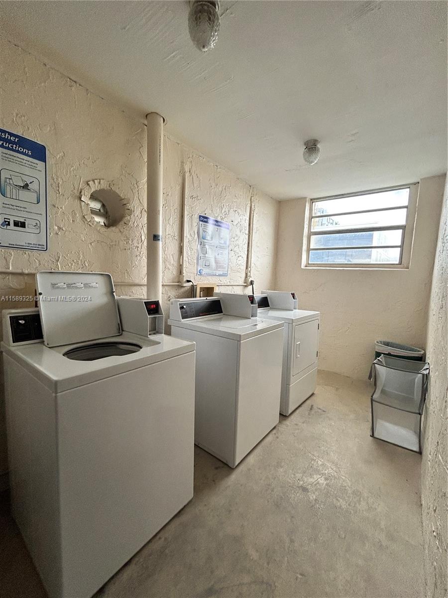 5050 Northwest 7th Street, Unit PH1 Miami, FL 33126 - Photo 33 of 36 a storage room with washer and dryer