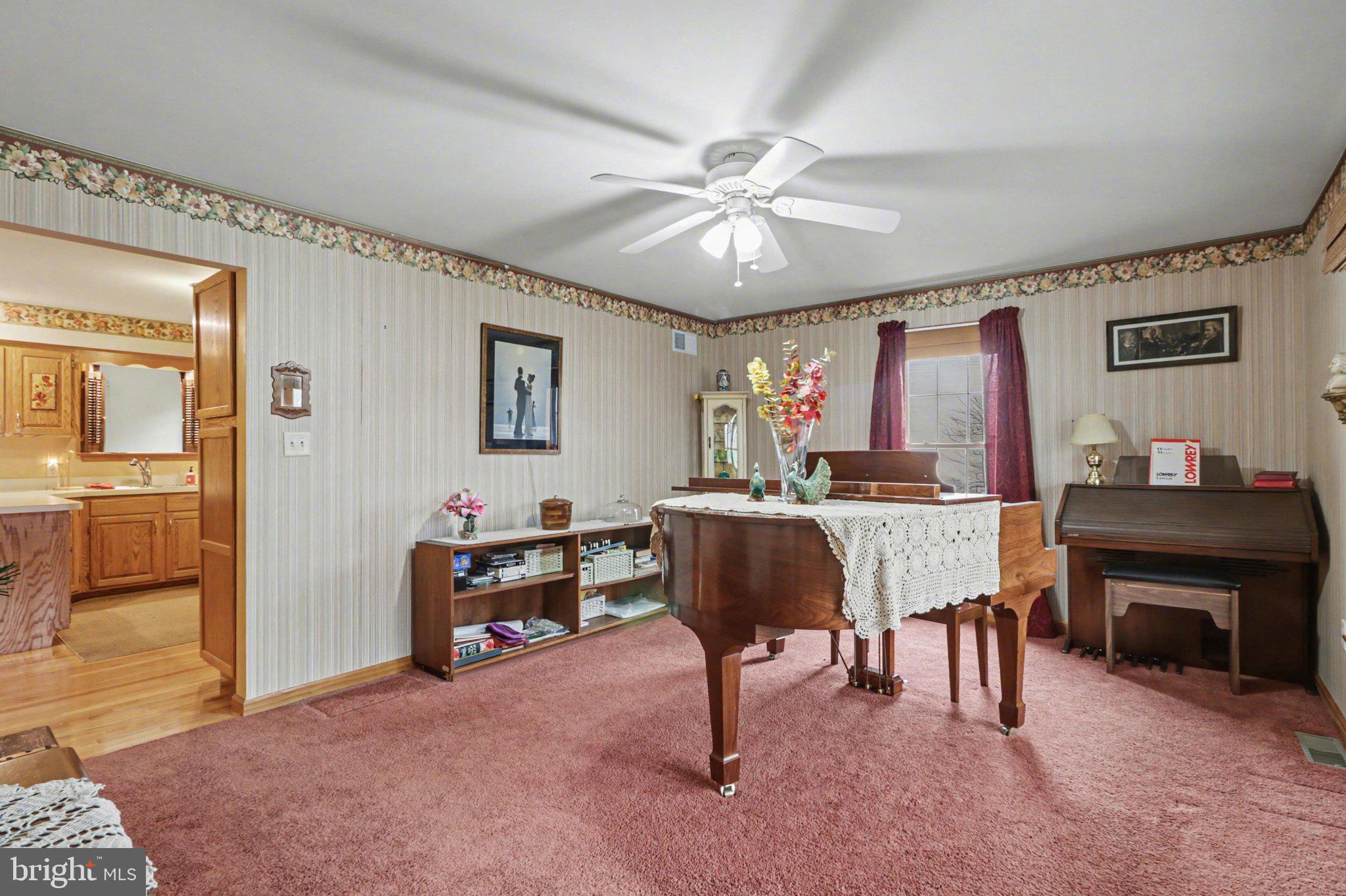 467 Beech Tree Street Shippensburg, PA 17257 - Photo 12 of 54 a living room with furniture and a flat screen tv